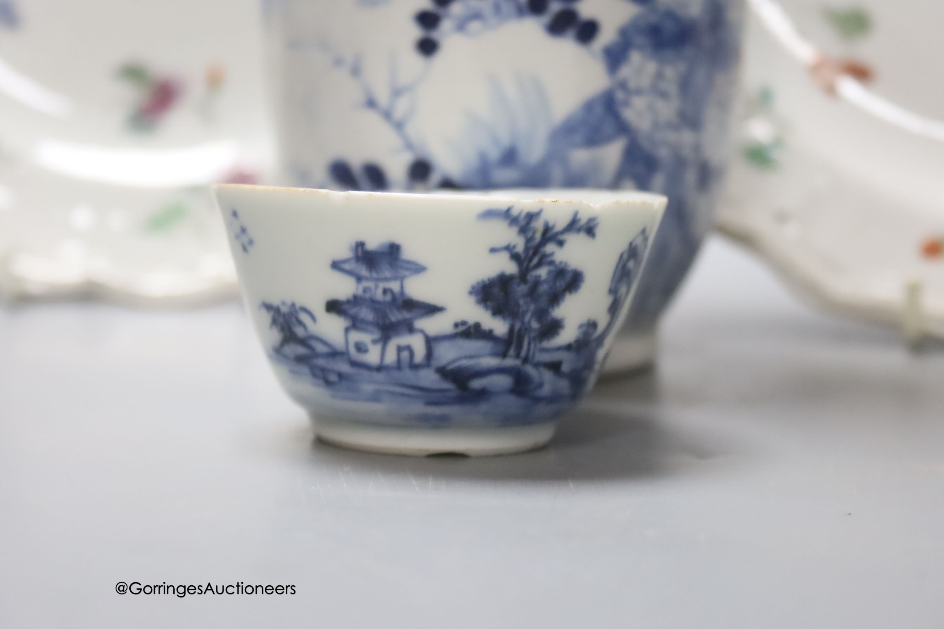 A Chinese late 19th century blue and white vase, height 25.5cm, a pair of 18th century Chinese export famille rose plates and a blue and white tea bowl